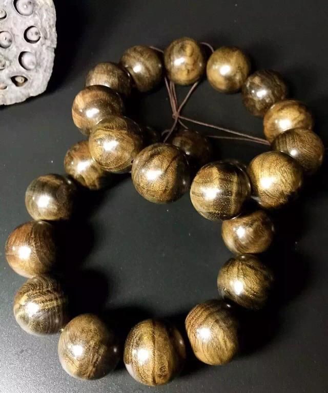 乌木怎么鉴别,乌木金丝楠手串怎么鉴定?图1